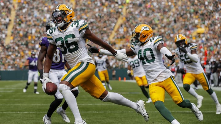 Green Bay Packers safety Anthony Johnson Jr. (36) celebrates after returning a fumble for a touchdown against the Baltimore Ravens.