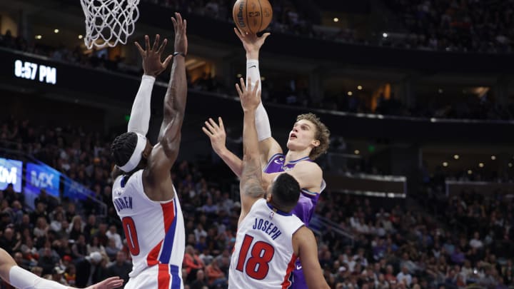 Nov 23, 2022; Salt Lake City, Utah, USA;  Utah Jazz forward Lauri Markkanen (23) tries to shoot the ball over Detroit Pistons center Jalen Duren (0) during the second half at Vivint Arena. Mandatory Credit: Chris Nicoll-USA TODAY Sports