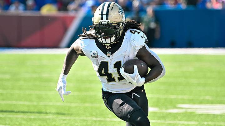 Sep 28, 2025; Orchard Park, New York, USA; New Orleans Saints running back Alvin Kamara (41) carries the ball against the Buffalo Bills in the third quarter at Highmark Stadium. Mandatory Credit: Mark Konezny-Imagn Images