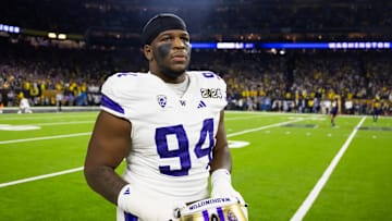 Jan 8, 2024; Houston, TX, USA; Washington Huskies defensive lineman Jayvon Parker (94) against the Michigan Wolverines during the 2024 College Football Playoff national championship game at NRG Stadium. Mandatory Credit: Mark J. Rebilas-Imagn Images