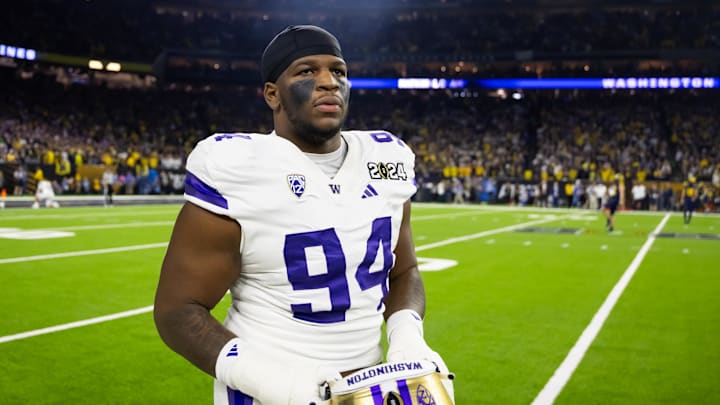 Jan 8, 2024; Houston, TX, USA; Washington Huskies defensive lineman Jayvon Parker (94) against the Michigan Wolverines during the 2024 College Football Playoff national championship game at NRG Stadium. Mandatory Credit: Mark J. Rebilas-Imagn Images