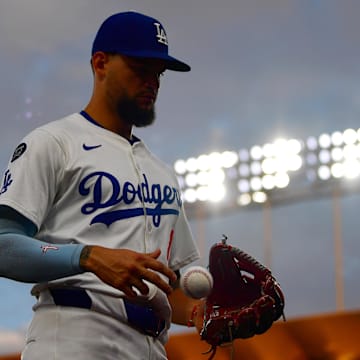 Jul 18, 2025; Los Angeles, California, USA; Los Angeles Dodgers outfielder Andy Pages (44) returns to the dugout in the third inning against the Milwaukee Brewers at Dodger Stadium. Mandatory Credit: Gary A. Vasquez-Imagn Images