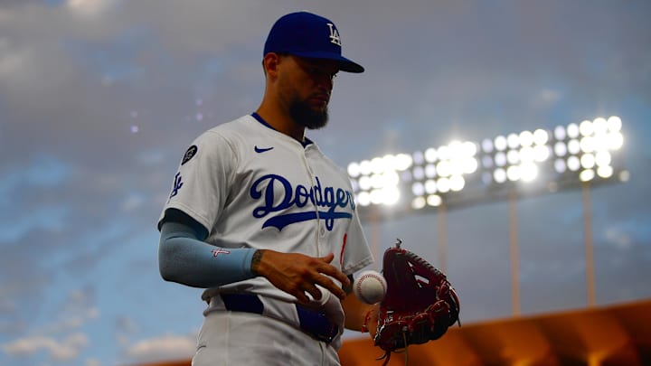 Jul 18, 2025; Los Angeles, California, USA; Los Angeles Dodgers outfielder Andy Pages (44) returns to the dugout in the third inning against the Milwaukee Brewers at Dodger Stadium. Mandatory Credit: Gary A. Vasquez-Imagn Images
