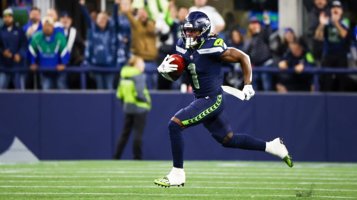 Aug 24, 2024; Seattle, Washington, USA; Seattle Seahawks wide receiver Dee Eskridge (1) returns a punt for a touchdown against the Cleveland Browns during the second quarter at Lumen Field. Mandatory Credit: Joe Nicholson-USA TODAY Sports