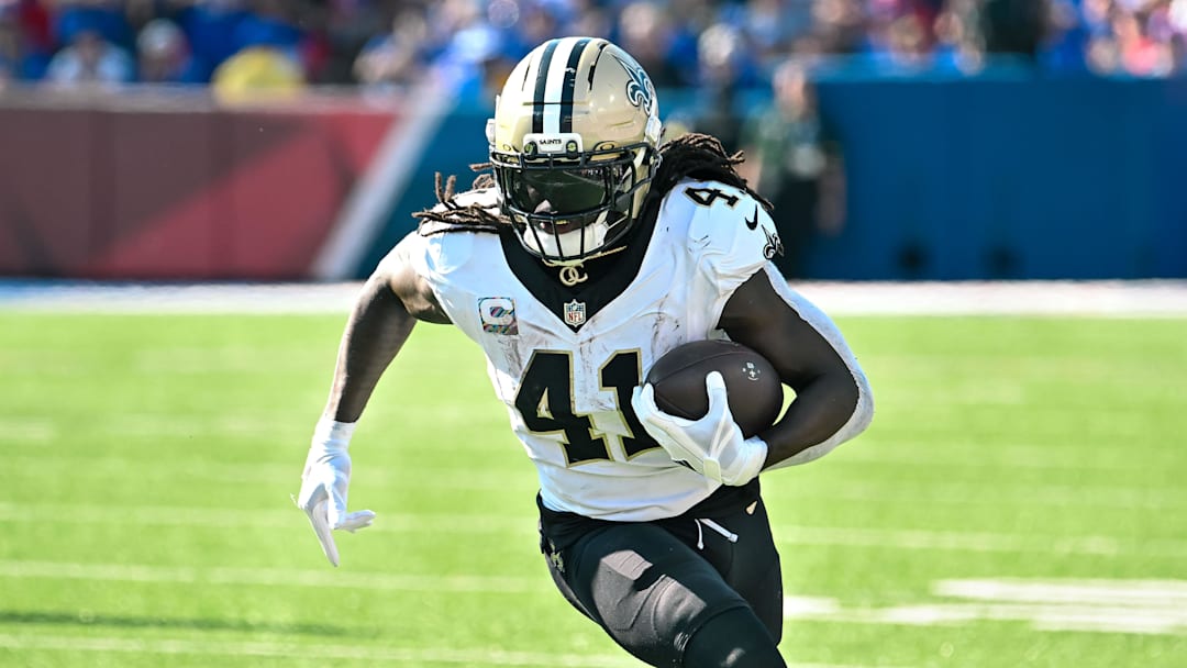 Sep 28, 2025; Orchard Park, New York, USA; New Orleans Saints running back Alvin Kamara (41) carries the ball against the Buffalo Bills in the third quarter at Highmark Stadium.