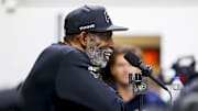 Apr 4, 2025; Boulder, CO, USA; Colorado Buffaloes head coach Deion Sanders speaks to the media at the University of Colorado NFL Showcase at the CU Indoor Practice Facility. Mandatory Credit: Michael Ciaglo-Imagn Images