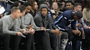 Dec 2, 2025; San Antonio, Texas, USA; Memphis Grizzlies guard Ja Morant (12) watches a game against the San Antonio Spurs from the bench at Frost Bank Center. Mandatory Credit: Scott Wachter-Imagn Images
