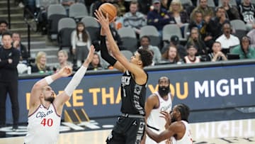 San Antonio Spurs center Victor Wembanyama (1) shoots over LA Clippers center Ivica Zubac (40) in the second half at Frost Bank Center. Mandatory Credit: Daniel Dunn-Imagn Images