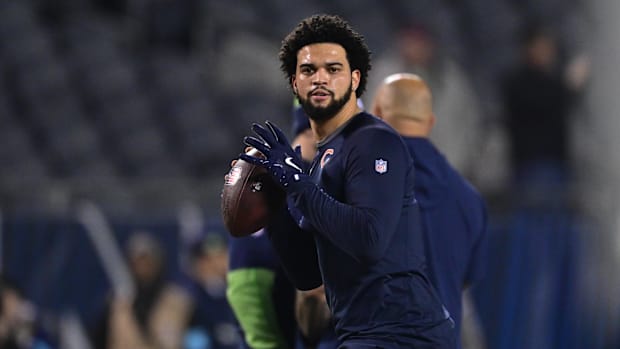 Dec 26, 2024; Chicago, Illinois, USA; Chicago Bears quarterback Caleb Williams (18) warms up before the game against the Seat