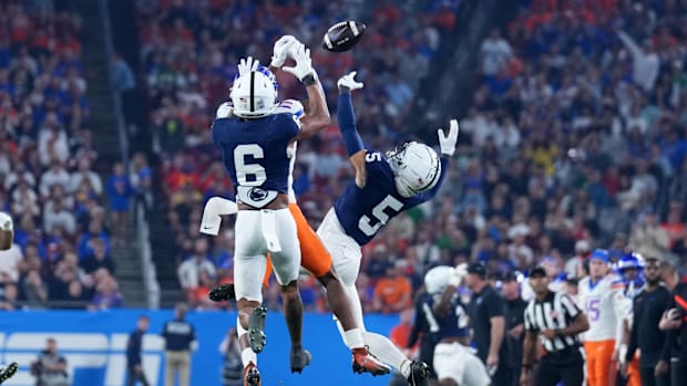 Penn State Nittany Lions cornerback Cam Miller (5) and safety Zakee Wheatley (6). 