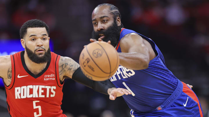 Mar 6, 2024; Houston, Texas, USA; Los Angeles Clippers guard James Harden (1) attempts to control the ball as Houston Rockets guard Fred VanVleet (5) defends during the first quarter at Toyota Center. Mandatory Credit: Troy Taormina-USA TODAY Sports