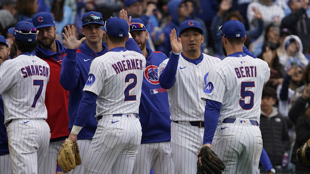 Apr 19, 2025; Chicago, Illinois, USA; The Chicago Cubs celebrate their win against the Arizona Diamondbacks at Wrigley Field.