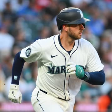 Seattle Mariners catcher Mitch Garver (18) runs towards first base after hitting a double against the Detroit Tigers during the fifth inning at T-Mobile Park on Aug 7.