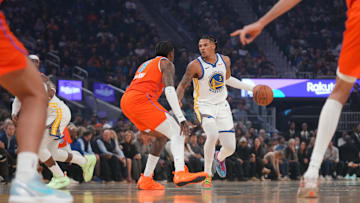 Dec 2, 2025; San Francisco, California, USA; Golden State Warriors guard Will Richard (3) dribbles the ball next to Oklahoma City Thunder guard Jalen Williams (8) in the first quarter at the Chase Center. Mandatory Credit: Cary Edmondson-Imagn Images