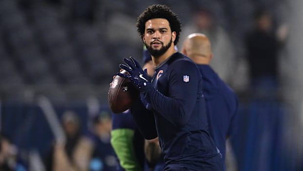 Dec 26, 2024; Chicago, Illinois, USA; Chicago Bears quarterback Caleb Williams (18) warms up before the game against the Seat