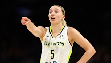 Jun 11, 2025; Phoenix, Arizona, USA; Dallas Wings guard Paige Bueckers (5) reacts against the Phoenix Mercury in the first half at PHX Arena. Mandatory Credit: Mark J. Rebilas-Imagn Images