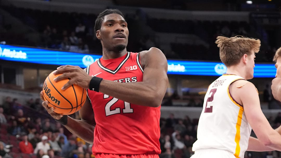 Mar 11, 2026; Chicago, IL, USA; Rutgers Scarlet Knights center Emmanuel Ogbole (21) grabs a rebound against the Minnesota Golden Gophers during the first half at United Center. Mandatory Credit: David Banks-Imagn Images