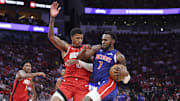 Oct 24, 2025; Houston, Texas, USA; Detroit Pistons forward Paul Reed (7) drives with the ball as Houston Rockets forward Jabari Smith Jr. (10) defends during the fourth quarter at Toyota Center. Mandatory Credit: Troy Taormina-Imagn Images