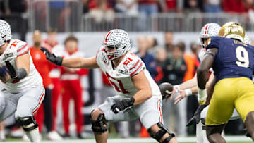 Jan 20, 2025; Atlanta, GA, USA; Ohio State Buckeyes offensive lineman Luke Montgomery (51) against the Notre Dame Fighting Irish during the CFP National Championship college football game at Mercedes-Benz Stadium. Mandatory Credit: Mark J. Rebilas-Imagn Images