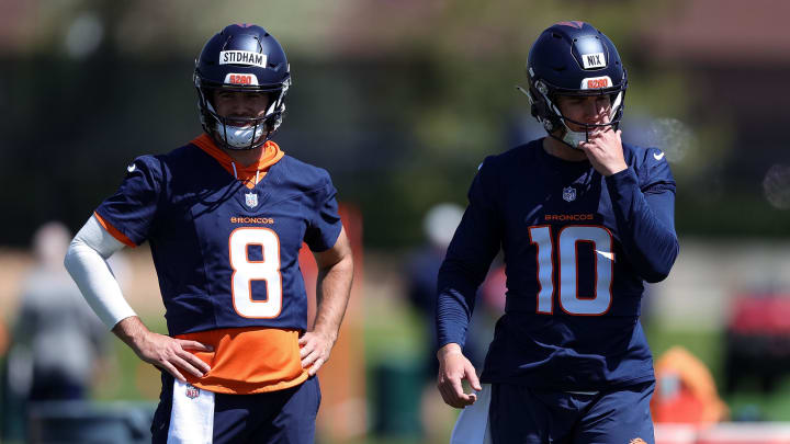 Denver Broncos quarterbacks Jarrett Stidham and Bo Nix during organized team activities at Centura Health Training Center.