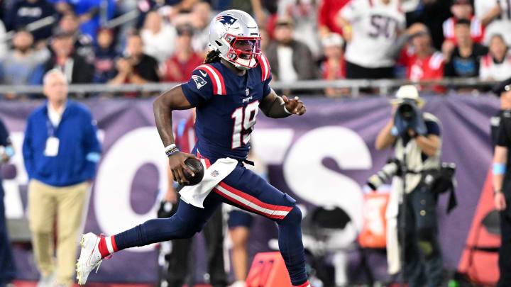 Aug 8, 2024; Foxborough, Massachusetts, USA; New England Patriots quarterback Joe Milton III (19) runs against against the Carolina Panthers  during the second half at Gillette Stadium. Mandatory Credit: Brian Fluharty-USA TODAY Sports