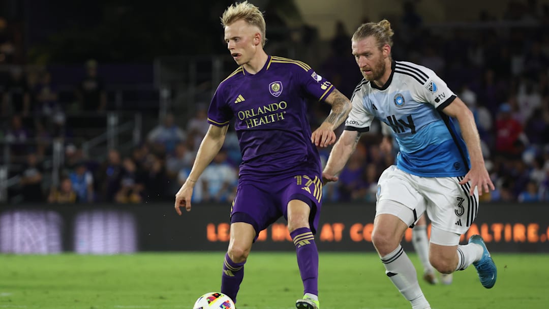 Nov 9, 2024; Orlando, Florida, USA; Orlando City midfielder Dagur Dan Thorhallsson (17) battles Charlotte FC defender Tim Ream (3) for the ball in the first half in a 2024 MLS Cup Playoffs Round One match at Inter&Co Stadium. Mandatory Credit: Kim Klement Neitzel-Imagn Images