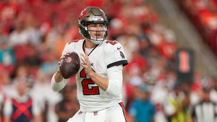 Aug 23, 2024; Tampa, Florida, USA; Tampa Bay Buccaneers quarterback Kyle Trask (2) drops back to pass against the Miami Dolphins in the first quarter during preseason at Raymond James Stadium. Mandatory Credit: Nathan Ray Seebeck-USA TODAY Sports