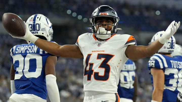 Denver Broncos running back Blake Watson (43) celebrates after scoring a touchdown against the Indianapolis Colts during the second half of a preseason game Sunday, Aug. 11, 2024, at Lucas Oil Stadium in Indianapolis. The Broncos defeated the Colts 34-30.