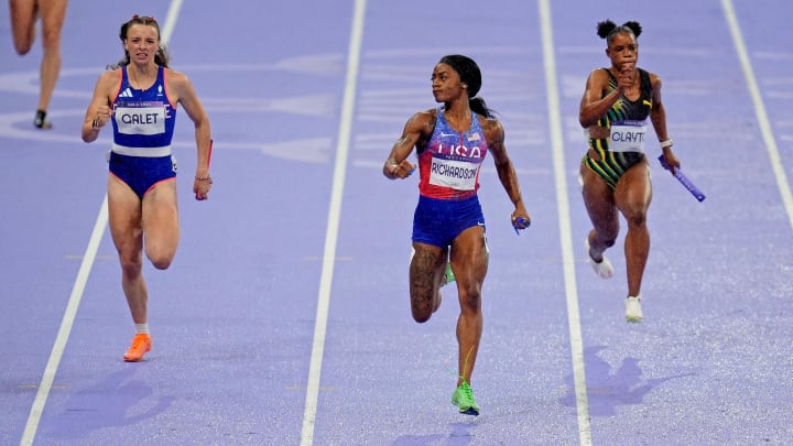 Sha'carri Richardson looks at her opponents as she wins the women's 4X100 relay during the 2024 Olympic Summer Games in Paris.