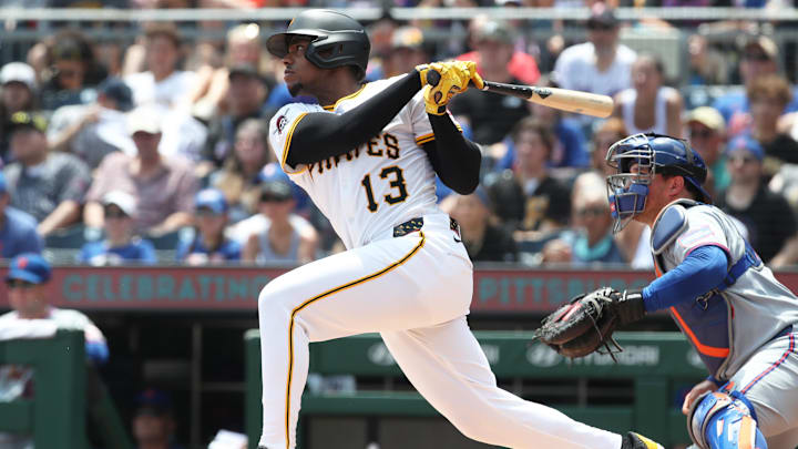 Jun 29, 2025; Pittsburgh, Pennsylvania, USA; Pittsburgh Pirates third baseman Ke'Bryan Hayes (13) hits a two run single against the New York Mets during the first inning at PNC Park. Mandatory Credit: Charles LeClaire-Imagn Images Jun 29, 2025; Pittsburgh, Pennsylvania, USA; Pittsburgh Pirates third baseman Ke'Bryan Hayes (13) hits a two run single against the New York Mets during the first inning at PNC Park. Mandatory Credit: Charles LeClaire-Imagn Images