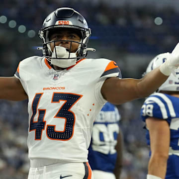 Denver Broncos running back Blake Watson (43) celebrates after scoring a touchdown against the Indianapolis Colts during the second half of a preseason game Sunday, Aug. 11, 2024, at Lucas Oil Stadium in Indianapolis. The Broncos defeated the Colts 34-30.