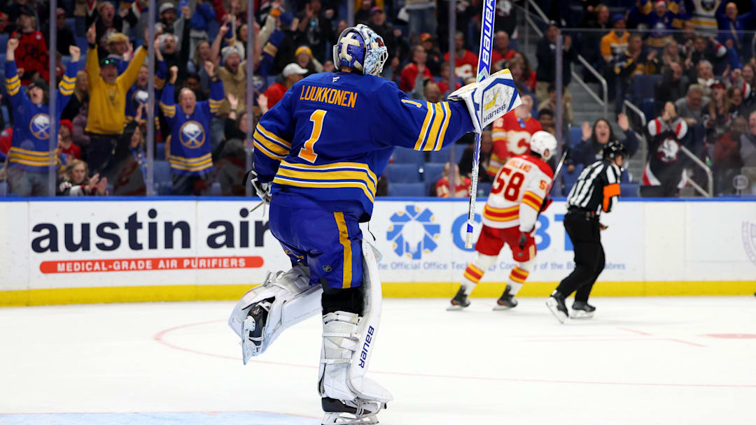 Nov 9, 2024; Buffalo, New York, USA;  Buffalo Sabres goaltender Ukko-Pekka Luukkonen (1) reacts after winning the game in a shootout against the Calgary Flames at KeyBank Center. Mandatory Credit: Timothy T. Ludwig-Imagn Images