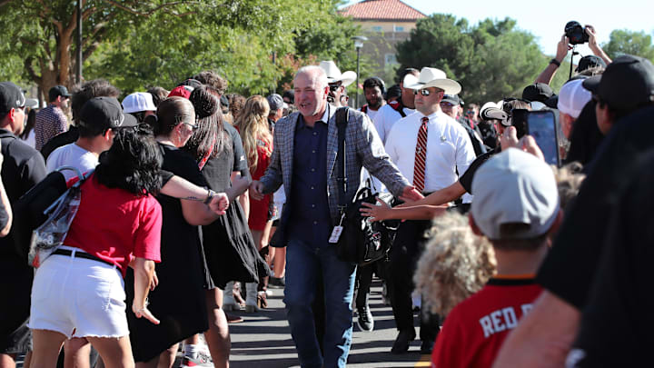Sep 28, 2024; Lubbock, Texas, USA;  Texas Tech Red Raiders head coach Joey McGuire greets fans before the game between the Cincinnati Bearcats and the Texas Tech Red Raiders at Jones AT&T Stadium and Cody Campbell Field. Mandatory Credit: Michael C. Johnson-Imagn Images