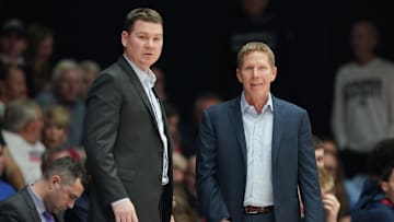 Feb 8, 2020; Moraga, California, USA; Gonzaga Bulldogs head coach Mark Few and assistant coach Tommy Lloyd look on during the first half against the Saint Mary's Gaels at McKeon Pavilion. Mandatory Credit: Darren Yamashita-Imagn Images