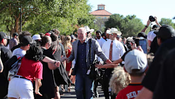 Sep 28, 2024; Lubbock, Texas, USA;  Texas Tech Red Raiders head coach Joey McGuire greets fans before the game between the Cincinnati Bearcats and the Texas Tech Red Raiders at Jones AT&T Stadium and Cody Campbell Field. Mandatory Credit: Michael C. Johnson-Imagn Images