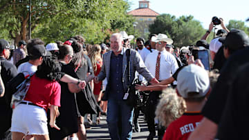 Sep 28, 2024; Lubbock, Texas, USA;  Texas Tech Red Raiders head coach Joey McGuire greets fans before the game between the Cincinnati Bearcats and the Texas Tech Red Raiders at Jones AT&T Stadium and Cody Campbell Field. Mandatory Credit: Michael C. Johnson-Imagn Images
