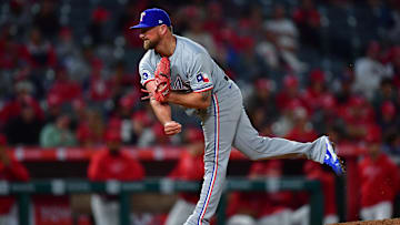 Sep 27, 2024; Anaheim, California, USA; Texas Rangers pitcher Kirby Yates (39) throws against the Los Angeles Angels during the ninth inning at Angel Stadium. Mandatory Credit: Gary A. Vasquez-Imagn Images