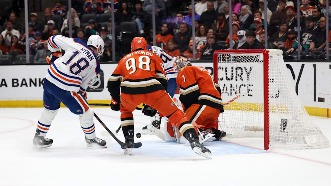 Feb 25, 2026; Anaheim, California, USA;  Edmonton Oilers left wing Zach Hyman (18) attacks a goal against Anaheim Ducks goaltender Lukas Dostal (1) during the first period at Honda Center. Mandatory Credit: Kiyoshi Mio-Imagn Images