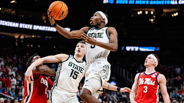 Michigan State guard Tre Holloman (5) goes to the basket against Ole Miss during the second half of the Sweet 16 round of NCAA tournament at State Farm Arena in Atlanta, Ga. on Friday, March 28, 2025.