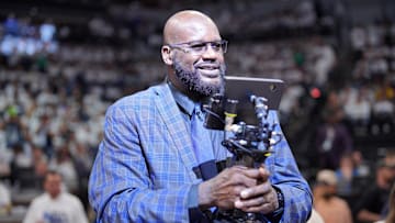 Shaquille O'Neal looks on during halftime between the Minnesota Timberwolves and the Dallas Mavericks.