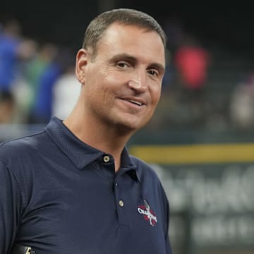 Jun 21, 2024; Arlington, Texas, USA; Texas Rangers general manager Chris Young (left) and Kansas City Royals general manager J.J. Picollo (right) talk before the game against the Kansas City Royals at Globe Life Field. Mandatory Credit: Jim Cowsert-Imagn Images