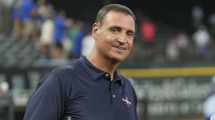 Jun 21, 2024; Arlington, Texas, USA; Texas Rangers general manager Chris Young (left) and Kansas City Royals general manager J.J. Picollo (right) talk before the game against the Kansas City Royals at Globe Life Field. Mandatory Credit: Jim Cowsert-Imagn Images