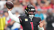 Oct 5, 2025; Glendale, Arizona, USA; Arizona Cardinals quarterback Kyler Murray (1) makes a throw against the Tennessee Titans during the fourth quarter at State Farm Stadium. Mandatory Credit: Joe Camporeale-Imagn Images