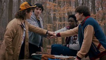 STRANGER THINGS. (L to R) Gaten Matarazzo as Dustin Henderson, Finn Wolfhard as Mike Wheeler, Caleb McLaughlin as Lucas Sinclair, and Noah Schnapp as Will Byers in STRANGER THINGS