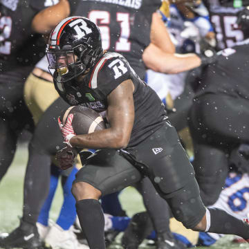 Jun 13, 2024; Ottawa, Ontario, CAN; Ottawa REDBLACKS running back Ryquell Armtead (25) runs the ball after a handoff in the second half against the Winnipeg Blue Bombers at TD Place. Mandatory Credit: Marc DesRosiers-USA TODAY Sports