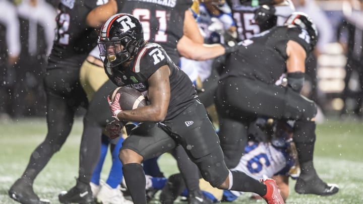 Jun 13, 2024; Ottawa, Ontario, CAN; Ottawa REDBLACKS running back Ryquell Armtead (25) runs the ball after a handoff in the second half against the Winnipeg Blue Bombers at TD Place. Mandatory Credit: Marc DesRosiers-USA TODAY Sports