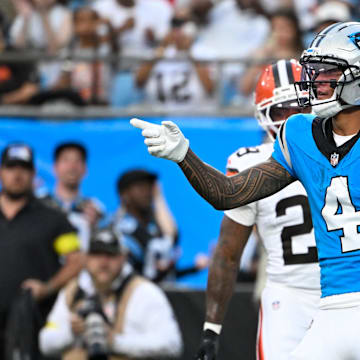 Aug 8, 2025; Charlotte, North Carolina, USA;  Carolina Panthers wide receiver Tetairoa McMillan (4) reacts in the first quarter at Bank of America Stadium. Mandatory Credit: Bob Donnan-Imagn Images