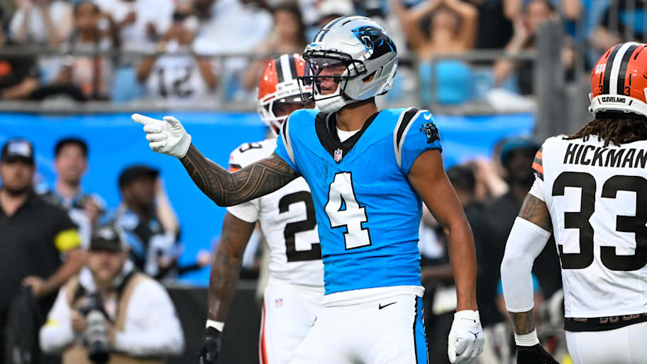 Carolina Panthers wide receiver Tetairoa McMillan (4) signals with his hand during a game against the Browns.