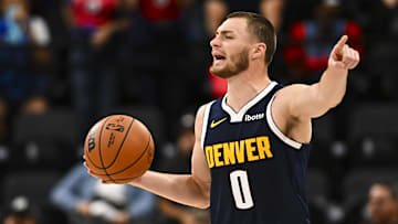 Oct 12, 2025; Inglewood, California, USA; Denver Nuggets forward Christian Braun (0) looks to pass the ball against the Los Angeles Clippers during the third quarter at Intuit Dome. Mandatory Credit: Jonathan Hui-Imagn Images