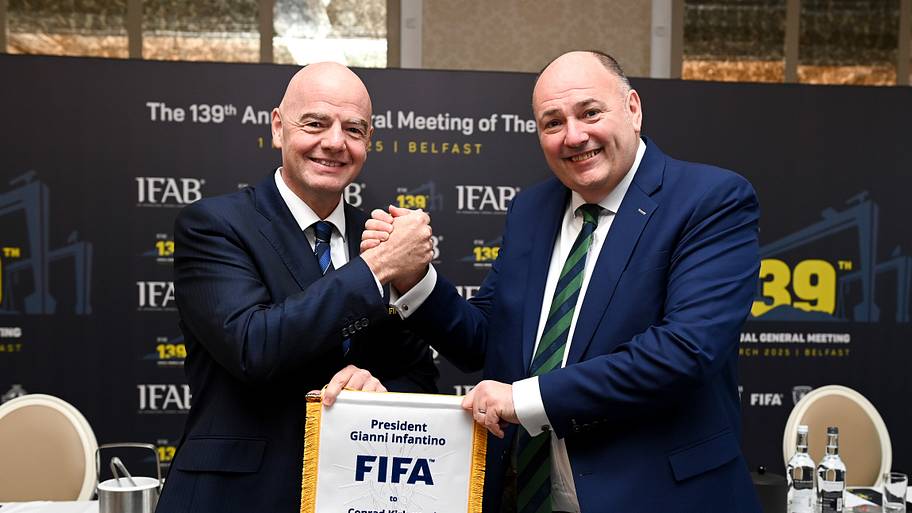 Gianni Infantino (left) at the annual IFAB meeting.